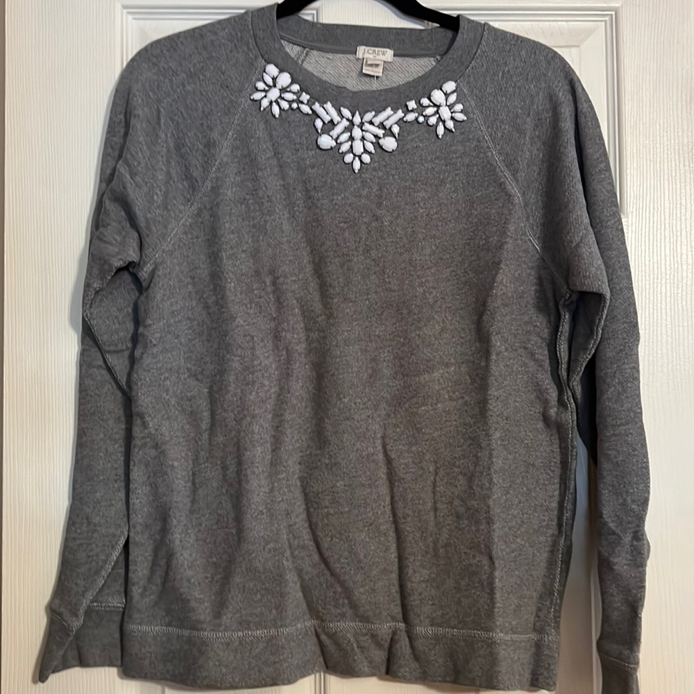 J. Crew crew neck sweatshirt with white jewel details around the collar.
